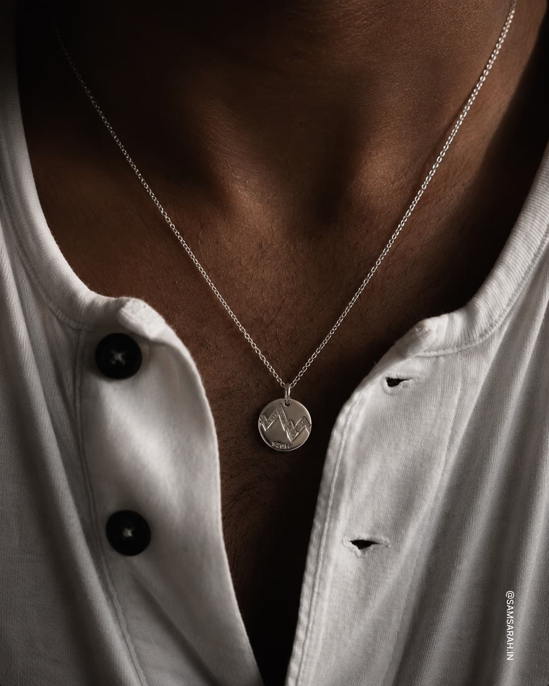Round Silver Crest Pendant 520 Frequency Necklace — worn